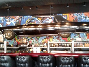 A vintage Cadillac dominates the bar at HopCat, Detroit?s go-to bar for craft beer on tap and its famous Crack Fries. (Wayne Newton/Special to Postmedia News)