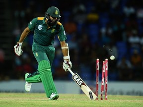 South African batsman Hashim Amla takes a run during their Tri-nation series One Day International match against Australia last week. (AFP)