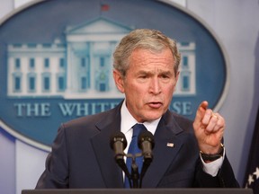 In this Jan. 12, 2009 file photo, President George W. Bush gestures during a news conference at the White House in Washington. Newly declassified documents disclose that President George W. Bush was worried about the image of shackled detainees wearing adult diapers inside the secret prison network the CIA operated abroad after the Sept. 11 attacks. (AP Photo/Ron Edmonds, File)
