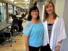 Lina Bowden, volunteer social finance consultant (left), and Michelle Baldwin, executive director of Pillar Nonprofit Network, inside Innovation Works on King Street in London Ont. June 15, 2016. CHRIS MONTANINI\LONDONER\POSTMEDIA NETWORK
