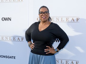 In this Wednesday, June 15, 2016 file photo, Oprah Winfrey arrives at the season one premiere of "Greenleaf" at The Lot in West Hollywood, Calif. Winfrey reacts to the Orlando mass shooting: "Are we a country that really believes that assault weapons should be made available to anybody? Are assault weapons necessary? I just say, 'Enough.'"  (Photo by Willy Sanjuan/Invision/AP, File)