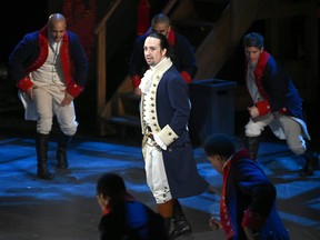 In this June 12, 2016 file photo, Lin-Manuel Miranda and the cast of "Hamilton" perform at the Tony Awards in New York. "Hamilton" took home 11 Tony Awards. Miranda said Thursday, June 16, 2016, that he is leaving his show this summer. Miranda said Thursday his last performance will be July 9.  (Photo by Evan Agostini/Invision/AP, File)