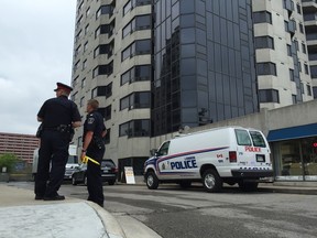 London police are investigating after the body of a dead baby was found in a dumpster at Mill and Richmond streets Thursday morning. (DALE CARRUTHERS, The London Free Press)