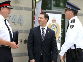 Chief Robert Keetch, of Sault Ste. Marie Police Service, MPP David Orazietti and Chief Supt. Don Bell, of Ontario Provincial Police, speak before a media event Thursday. The event was held at OPP's forensic identification unit on Great Northern Road.