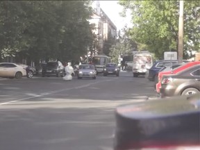 A robot named Promobot escaped from a laboratory in Russia, but then caused a traffic jam when its battery ran out in the middle of the street. (Promobot/YouTube screengrab)