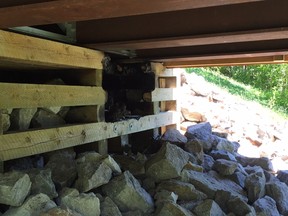 Fire damage under the Brabant-Philippe covered bridge in Gatineau. Tom Spears/Postmedia