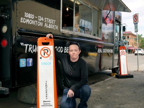 EDMONTON, ALBERTA: JUNE 16, 2016 - Alyssa MacDonald, Smokehouse BBQ food truck kitchen manager, in front of her food truck on 107 Street, south of Jasper Avenue. (PHOTO BY LARRY WONG/POSTMEDIA NETWORK)