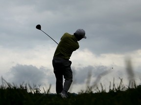 Andrew Landry watches his tee shot on the seventh hole during the first round of the U.S. Open golf championship at Oakmont Country Club in Oakmont, Pa., on June 16, 2016. (AP Photo/Charlie Riedel)