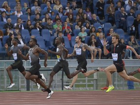 Aaron Brown of Canada (far left), Alonso Edward of Panama, Ameer Webb of USA, Christophe Lemaitre of France and Ramil Guliyev of Turkey compete in the men's 200m event at the Rome's Diamond League competition in Rome on June 2, 2016. (AFP PHOTO/ANDREAS SOLARO)