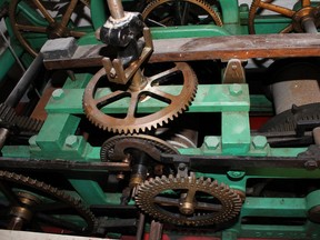 The mechanism inside the tower controls the clock’s faces, both of which currently display different times in the St Andrews Church bell tower in Kingston, Ont. seen here on Thursday, June 16, 2016. Jane Willsie for The Whig-Standard/Postmedia Network