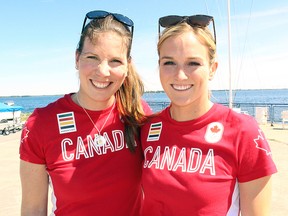 Danielle Boyd, left, and Erin Rafuse, who will compete in the Rio 2016 Summer Olympics, are seen at their fundraiser at the Kingston Yacht Club in Kingston on Thursday. (Julia Balakrishnan/For The Whig-Standard)