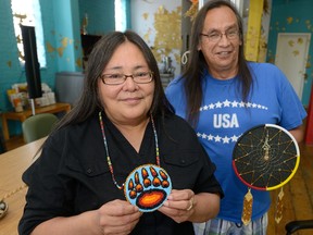 Debra Kennedy and Sanford Cottrell show a dream crafts they made for Aboriginal Solidarity Day festivities next week. Photo taken on Friday June 17, 2016. (MORRIS LAMONT, The London Free Press)