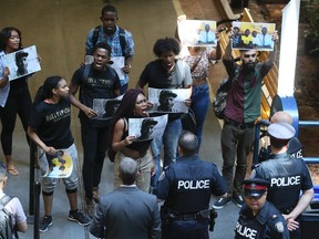 A Black Lives Matter group disrupts a police services meeting on Friday June 17, 2016. Veronica Henri/Toronto Sun/Postmedia Network