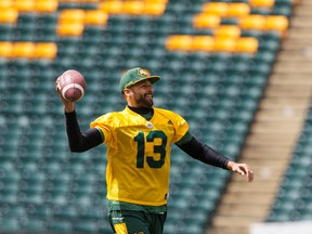 Quarterback Mike Reilly runs a drill during an Edmonton Eskimos walkthrough at Commonwealth Stadium in Edmonton, Alta., on Friday June 17, 2016.