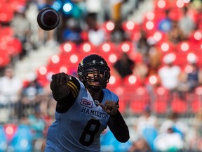 Hamilton Tiger-Cats QB Jeremiah Masoli throws a pass against the Toronto Argonauts during the first half of CFL football preseason action, at the first ever CFL football game played at BMO Field, in Toronto, Saturday June 11, 2016. (THE CANADIAN PRESS/Mark Blinch)