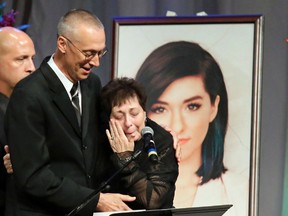 Bud and Tina Grimmie talk about their daughter during memorial service for Christina Grimmie, at Fellowship Alliance Chapel in Medford, N.J. on June 17, 2016.  Grimmie, the Voice contestant & YouTube star was shot to death last week while signing autographs after a concert in Orlando, Fla.  (Elizabeth Robertson/The Philadelphia Inquirer via AP)