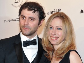 FILE - In this Feb. 9, 2011 file photo, Chelsea Clinton and husband Marc Mezvinsky attend amfAR's annual New York Gala at Cipriani Wall Street in New York. On Saturday, June 18, 2016, Chelsea Clinton announced on Twitter that she has given birth to her second child, son Aidan.
