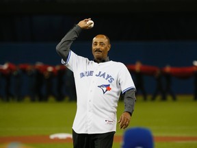 Former Toronto Blue Jays Manager Cito Gaston throws out the ceremonial first pitch in game one of the American League Division Series in Toronto, Ont. on Thursday October 8, 2015. STAN BEHAL /Toronto Sun/Postmedia Network