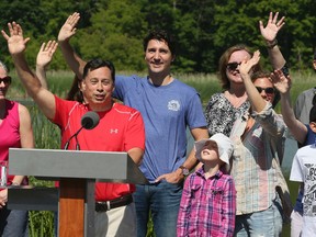 Brad Duguid (L), with Prime Minister Justin Trudeau along with his wife Sophie and daughter Ella-Grace on Saturday June 18, 2016 in Rouge Park in Scarborough. Veronica Henri/Toronto Sun/Postmedia Network