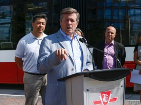 Toronto mayor John Tory was on hand at the unveiling of the TTC's new streetcar line - the Cherry St #514 - rolling Saturday at the Distillery District loop (Jack Boland/Toronto Sun)