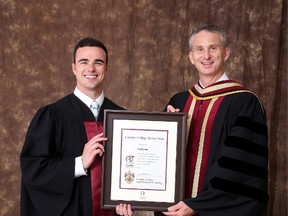 Supplied photo
Cambrian College president Bill Best (right) presents the Alumni Award to Paul Leduc.