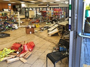 A look at the damage inside a 7-Eleven convenience store on St. Anne's Road in Winnipeg on Sunday, June 19, 2016. A 23-year-old man driver crashed into the building on Friday night after experiencing a medical issue, police say. (Kevin King/Winnipeg Sun/Postmedia Network)