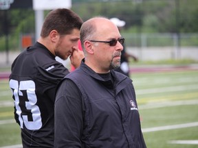 Redblacks GM Marcel Desjardins made 22 cuts yesterday to get the roster down to 46 players. (Tim Baines/Ottawa Sun)