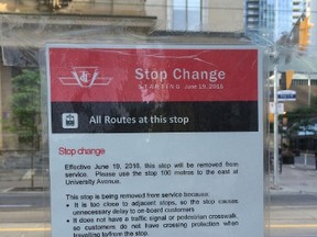 A sign posted in the TTC shelter at Simcoe and King Sts. Sunday, June 19, 2016. The streetcar stop is no longer in use. (Cynthia McLeod/Toronto Sun)
