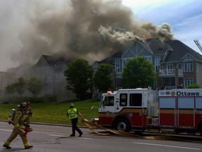 Fire at 1841 Campeau drive in Kanata on Sunday, June 19, 2016. (Bruno Schlumberger)