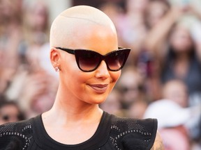 Amber Rose poses for photographs on the red carpet during the Much Music Video Awards in Toronto on Sunday, June 19, 2016. THE CANADIAN PRESS/Mark Blinch