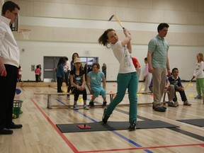 Students at Monsignor Fee Otterson school learn golf under the watchful eye of local pro Landon Hargreaves in this 2011 photo. The national Golf in Schools programs has more than 100 Edmonton area schools participating. (File)