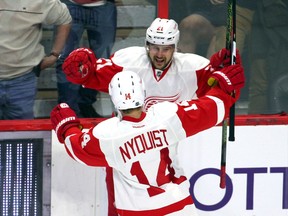 Detroit Red Wings left winger Tomas Tatar celebrates his goal against the Ottawa Senators with teammate centre Gustav Nyquist during a game at Canadian Tire Centre in Ottawa on Nov. 16, 2015. (Jean-Yves Ahern/USA TODAY Sports)