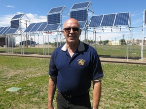 Vulcan, Alta. Mayor Tom Grant stands in front of a new solar park opened by the town on Monday, June 13, 2016. He hopes the park will help boost tourism. THE CANADIAN PRESS/Bill Graveland