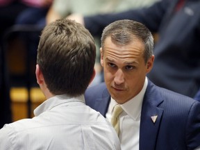 In this photo taken April 3, 2016, Donald Trump’s campaign manager Corey Lewandowski talks to a member of the media at Nathan Hale High School in West Allis, Wis. Lewandowski is leaving the campaign, following a tumultuous stretch marked by missteps and infighting. (AP Photo/Charles Rex Arbogast)