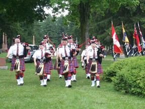 The Decoration Day procession included the legion colour party and pipe band. (Justine Alkema/Clinton News Record)