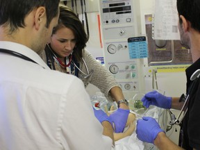Medical student Jacquie Gilbank focuses during Friday's medical simulation at the Pincher Creek Health Centre.