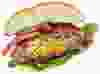 Mac N’ Cheese Stuffed Burgers. Macaroni & cheese-stuffed beef patties served w/classic burger toppings