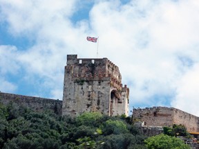 In this May 12, 2106 photo, the Union Jack flies over The Tower of Homage in Gibraltar. The tower is a leftover from when the Moors occupied Gibraltar between 711 and 1309 and again between 1350 and 1462. (AP Photo/Brian Witte)