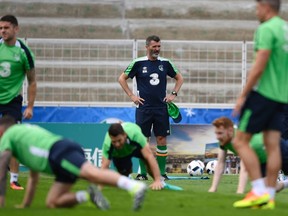 Irish football manager Roy Keane watches his players during a training session of the Republique of Ireland team at the Stade Municipal Montbauron stadium in Versailles, near Paris, on June 11, 2016, during the Euro 2016 football tournament. (AFP PHOTO/MIGUEL MEDINA)