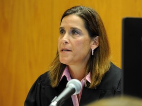 Superior Court Judge Barbara Bellis speaks during a hearing in Bridgeport, Conn., Monday, June 20, 2016. The judge heard arguments brought to dismiss a wrongful death lawsuit against rifle maker Remington Arms over the Sandy Hook Elementary School massacre. A total of 20 first-graders and six adults were fatally shot with an AR-15-style Bushmaster rifle made by Remington.  (Ned Gerard/The Connecticut Post via AP, Pool)
