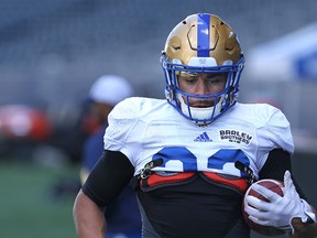 Running back Andrew Harris runs a drill during Winnipeg Blue Bombers practice at Investors Group Field in Winnipeg on Mon., June 20, 2016. Kevin King/Winnipeg Sun/Postmedia Network