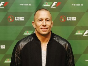 MMA fighter Georges St-Pierre arrives at the Official F1 Heineken Party After The Canadian Grand Prix in Montreal on June 12, 2016. (Mark Blinch/Getty Images for Heineken/AFP)