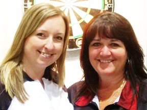Local dart champ, Kim Whaley Hilts (right), joins Maria Mason of Bowmanville on Team Canada for the Americas Cup competition next month in Barbados. (Submitted photo)