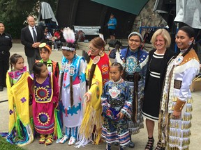 Premier Rachel Notley has photos taken with powwow dancers at a National Aboriginal Day ceremony just outside the Borden Park Bandshell in Edmonton on Tuesday, June 21, 2016. Photo Juris Graney