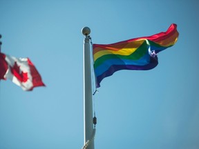 File photo of a rainbow flag flies at Queen's Park at the annual Pride flag raising ceremony at the official launch of Pride Month in Toronto on Wednesday, June 1, 2016. THE CANADIAN PRESS/Eduardo Lima