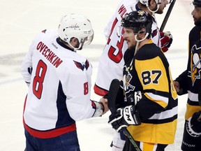 Washington Capitals left winger Alex Ovechkin and Pittsburgh Penguins centre Sidney Crosby shake hands after Game 5 of the second round of the NHL playoffs at the CONSOL Energy Center in Pittsburgh on May 10, 2016. (Charles LeClaire/USA TODAY Sports)