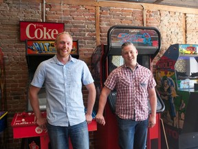 General manager Rob Sheldon, left, and owner Jonathan McCreery are seen inside the nearly completed Barcadia bar-arcade hybrid on Princess Street. (Victoria Gibson/For The Whig-Standard)