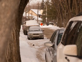 Cars parked on 125th Street north of 102 Avenue on January 20, 2016, in Edmonton.  Greg Southam/POSTMEDIA NETWORK