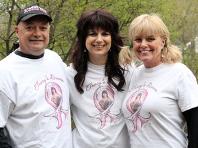 Tracy Dinelle, centre, received great support from her husband, Dennis, and mother, Rena Ross, during her cancer battle. JEFFREY OUGLER/SAULT STAR