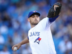 Marco Estrada of the Toronto Blue Jays delivers a pitch in the first inning against the Arizona Diamondbacks at the Rogers Centre in Toronto on June 21, 2016. (Tom Szczerbowski/Getty Images/AFP)